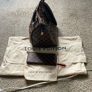 Woman’s bag and wallet.